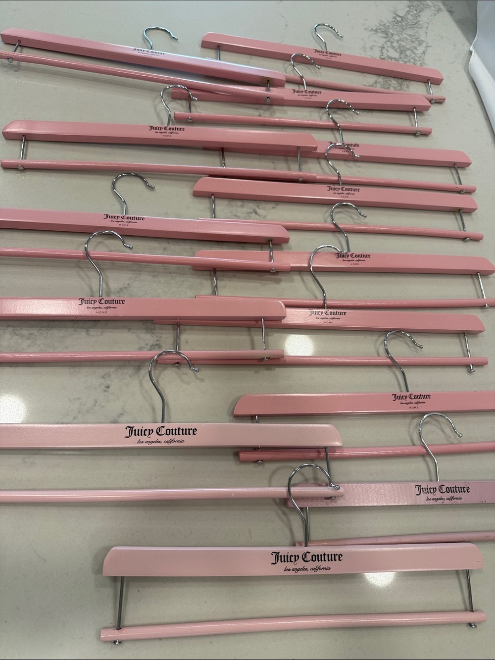 Juicy Couture Pink Wooden Pant Hangers - Set of Multiple